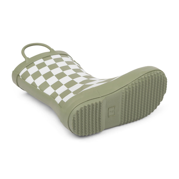 Detail image of green and white checkered colored children's rain boot focusing on the sole with texture and size stamped into the bottom on a white background.