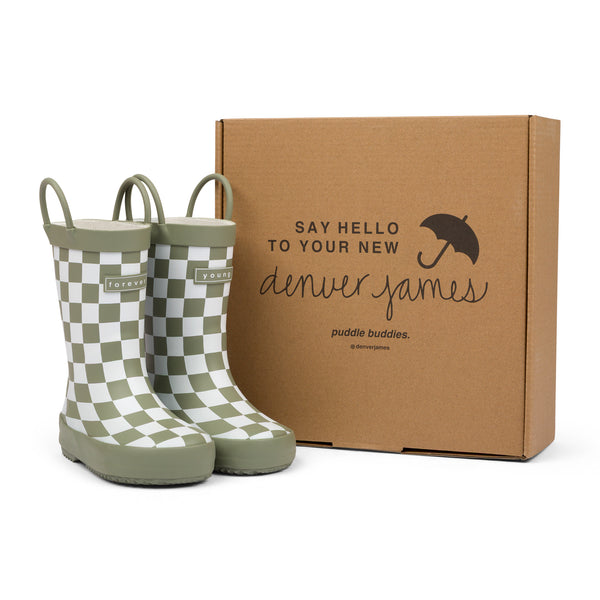 Golden and white checkered rain boots with a cardboard box branded with 'Denver James' on a white background.
