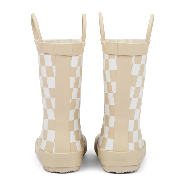 Back view of tan and white checkered children's rain boots with grip handles for easy slip on, on a white background.