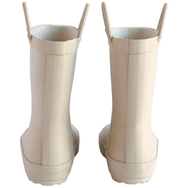 Back view of a pair of sand colored rain boots for children on white. Showing pull handles for easy slip on.
