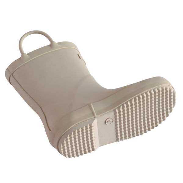 Detail shot of sand colored children's rain boot focusing on the sole of the boot with the size stamped into the bottom.