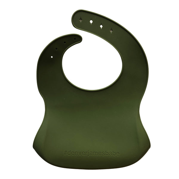 Back view of a bright green silicone bib on a white background with '#denverjamesbabe' text.