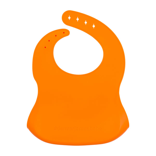 Back View of a bright orange silicone food catcher bib on a white background.