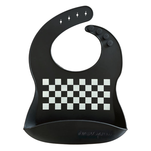 Front view of black food catcher bib with a white checkered pattern on a white background, clasps read 'babe' while the 'denver james' logo is imprinted on the bottom. 