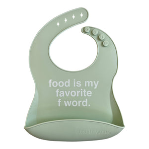 Front View of a light green silicone food catcher bib with 'food is my favorite f word.' text on a white background.
