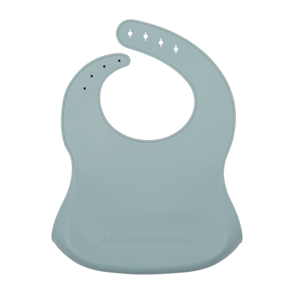 Back View of a blue/grey silicone food catcher bib on a white background.