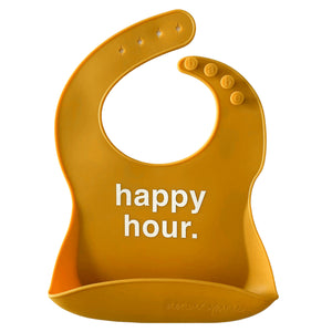 Front View of a dark orange silicone food catcher bib with 'happy hour.' text on a white background.