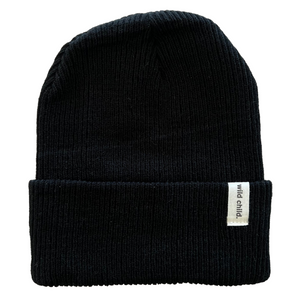 Black beanie on white background with 'wild child' tag