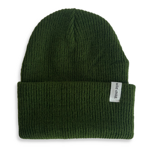 Front view of an olive colored beanie with a 'wild child' tag on a white background. 