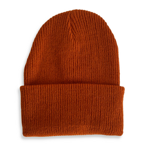 Back view of a rust colored kids beanie on a white background. 