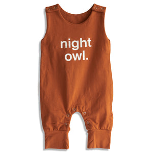 Rust baby romper with 'night owl' text on a white background