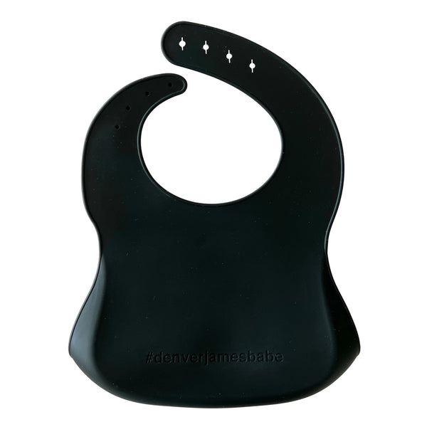 Back view of a black silicone bib on a white background with '#denverjamesbabe' text.