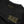Detail view of kids black sweatshirt that says 'Rad.' on a white background. 