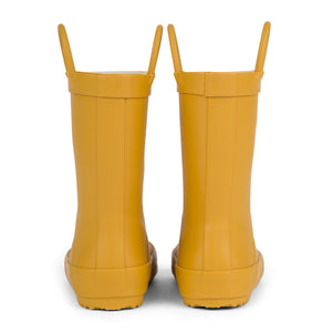 Back view of a pair of golden colored rain boots for children. Showing pull handles for easy slip on.