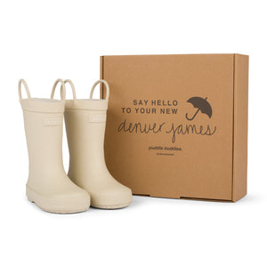 Sand colored checkered rain boots with a cardboard box branded with 'Denver James' on a white background. 