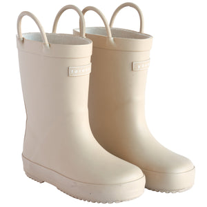 Front 3/4 view of a pair of sand colored rain boots for children. Showing pull handles for easy slip on and tags that say "Forever Young" on the front. 