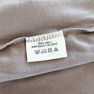 wash tag for tan baby romper