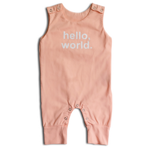 Pink baby romper with 'hello, world.' text on a white background