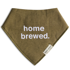 Brown bandana baby drool bib with 'home brewed.' text on a white background