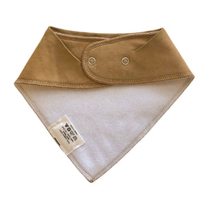 Back view of beige baby drool bib on white background with snaps