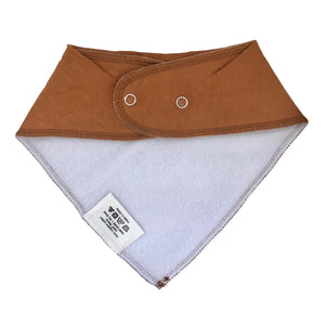 Back view of brown baby bib with snaps on white background. 